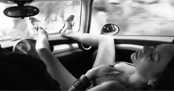 girl in the front seat rubbing her pussy