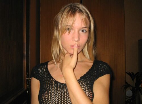 blonde finger ove mouth